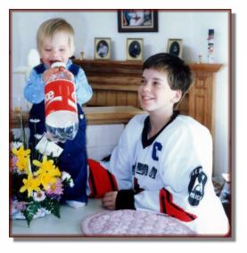 Andy goofing around with Mike after a hockey game